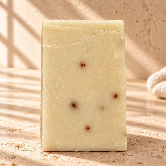 Cedar Trail soap — AI-styled limestone setting using the product photograph.