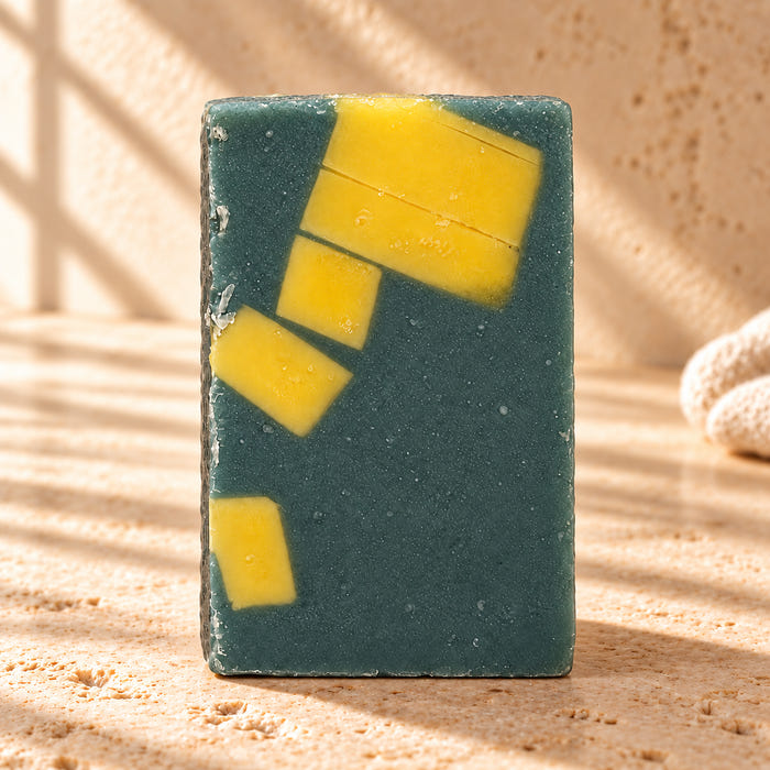 Island Swirl soap — AI-styled limestone setting using the product photograph.